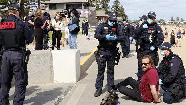 Tensions flared when protesters reached Elwood Beach. Picture: Matrix