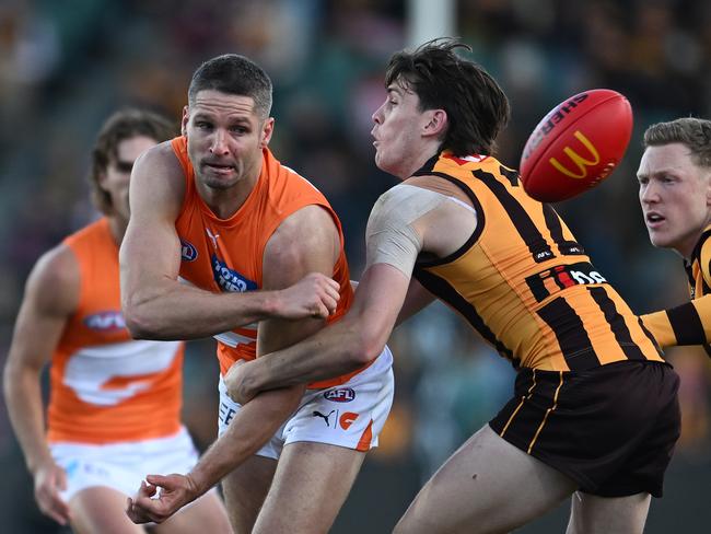 Jesse Hogan of the Giants handballs during the round 13 AFL match between Hawthorn Hawks and GWS GIANTS at University of Tasmania Stadium, on June 08, 2024, in Launceston, Australia. (Photo by Steve Bell/Getty Images)