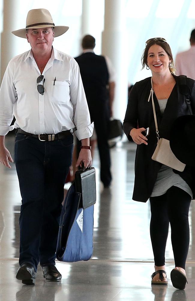 Mr Joyce and Ms Campion make their way to an airport lounge. Picture: Kym Smith