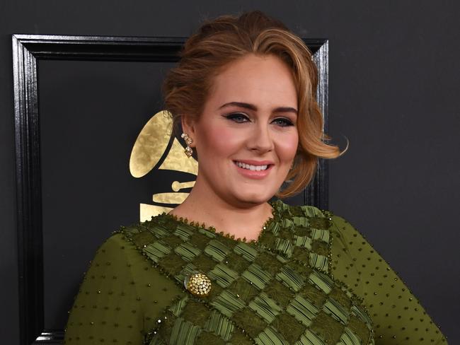 The Grammy-winning superstar made a special visit to victims of the Grenfell Tower tragedy. Picture: AFP