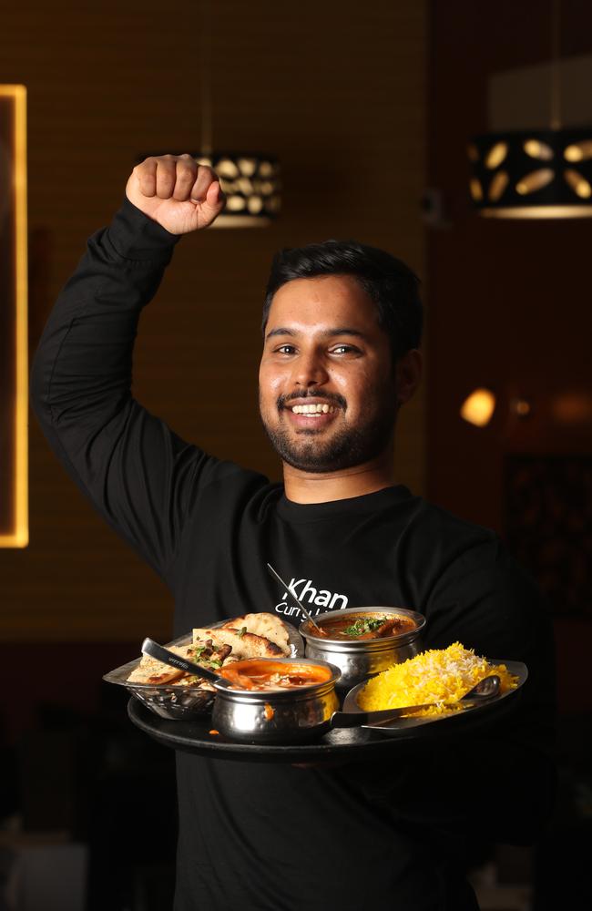 Khan Curry Hut owner Zeeshan Jameel celebrates how his Indian restaurant has been voted the best in Geelong. Picture: Alan Barber