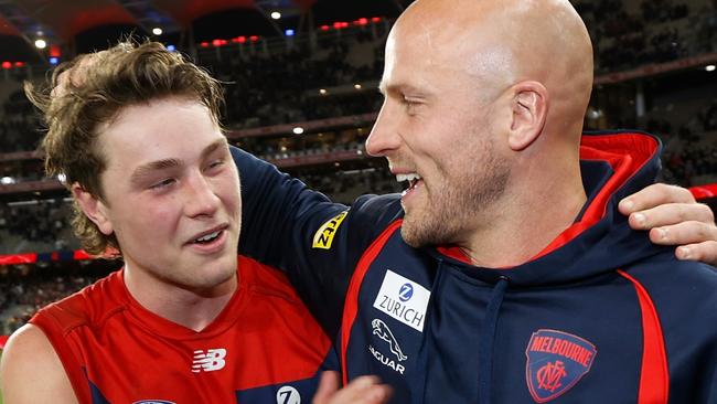 Tom Sparrow (left) and Nathan Jones celebrate after Melbourne’s preliminary final win over Geelong. Picture: Michael Willson/AFL Photos