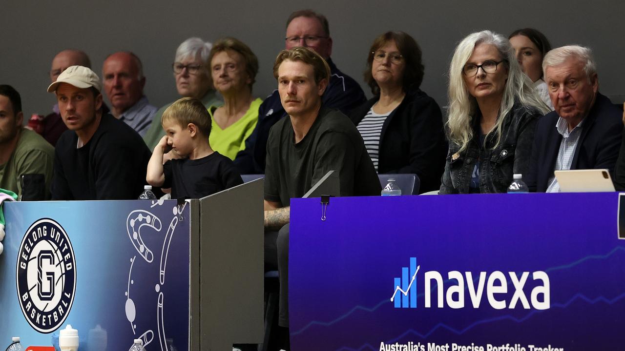 GEELONG, AUSTRALIA - OCTOBER 30: Tom Stewart, Geelong AFL player looks on during the round one WNBL match between Geelong United and Townsville Fire at The Geelong Arena, on October 30, 2024, in Geelong, Australia. (Photo by Kelly Defina/Getty Images)