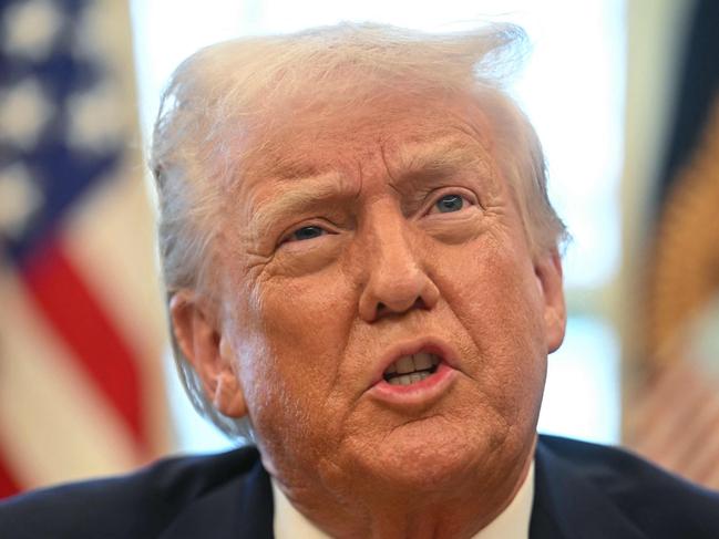 US President Donald Trump speaks to the press after signing an executive order to create a US sovereign wealth fund, in the Oval Office of the White House on February 3, 2025, in Washington, DC. (Photo by Jim WATSON / AFP)