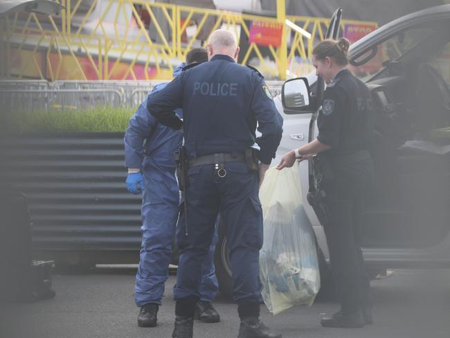 Officers take evidence from the scene today. Picture: NCA NewsWire / Damian Shaw