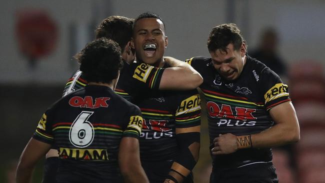 Penrith's Stephen Crichton celebrates after scoring a try. Picture: Brett Costello