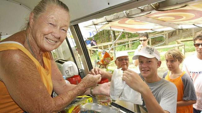 A $1 Betty's Burger to go please they say as Betty Wallace delivers.