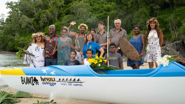 Maria Pokia, Uncle Peter Hyde, Esmay Cedric, Johnathon Vemoa, Charlie McKillop, Kiara Henderson, Junjun Wangal, Giragira Narrnggay, Hazel Patterson, Meradine Hohepa, front Ramina Gadd, Mulginhi Underwood and Bradley Cedric behind one of the blessed canoes traditionally named Bumi; meaning thunder. Picture: Emily Barker