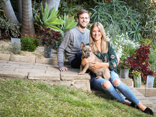 05-09-18 - Andrew McGuire (30yrs) with his wife Jessica McGuire (32yrs) and dog Mav at home in Paddington. Picture By Ryan Osland