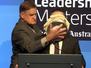 NOTE AUSTRALIAN NEWSPAPER OUTQantas CEO Alan Joyce has cream pie on his face after being attacked by a man who came from back stage while addressing a West Leadership Matters breakfast at the Hyatt Regency hotel in Perth.Picture The West Australian