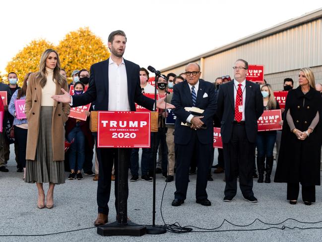 Eric Trump, son of U.S. President Donald Trump, speaks while flanked by his wife Lara Trump, former New York City Mayor Rudy Giuliani, Trump campaign ballot counting observer Jeremy Mercer, and former Florida Attorney General Pam Bondi during a news conference at Atlantic Aviation PHL private air terminal in Philadelphia, Pennsylvania, U.S. November 4, 2020.  REUTERS/Mark Kauzlarich