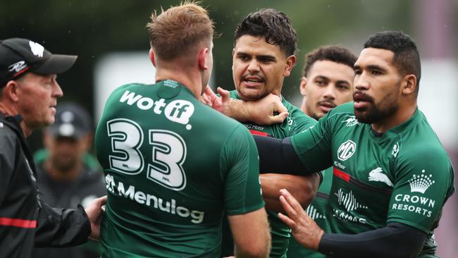 SYDNEY, AUSTRALIA - MARCH 08: Latrell Mitchell wrestles with Jacob Host during a South Sydney Rabbitohs NRL Training Session at Redfern Oval on March 08, 2022 in Sydney, Australia. (Photo by Matt King/Getty Images)