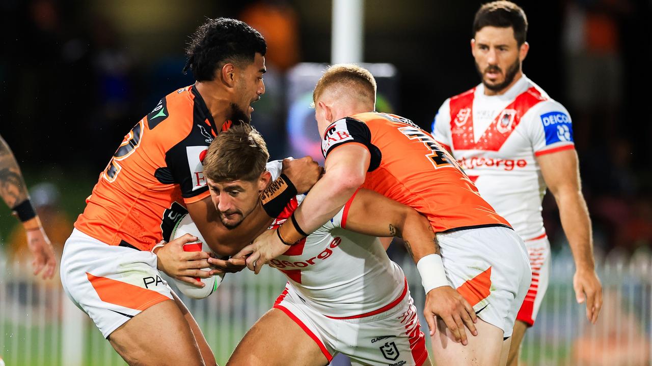 Zac Lomax of the Dragons is tackled during the NRL Pre-season challenge match between St George Illawarra Dragons and Wests Tiger. Picture: Getty Images