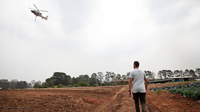 Stephen Grima watching the RFS helicopter. Picture: Adam Yip