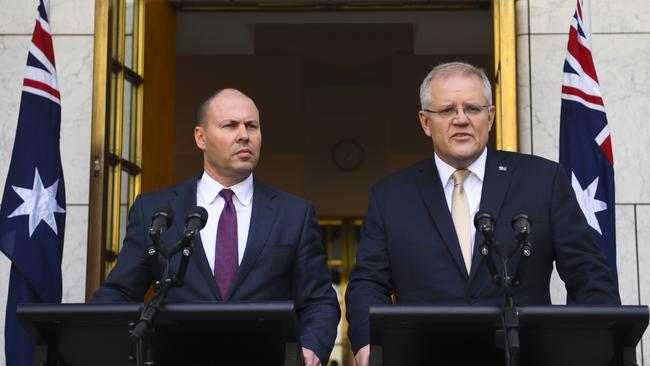 Prime Minister Scott Morrison (right) and Treasurer Josh Frydenberg reveal details of the government’s coronavirus stimulus package. Picture: Lukas Coch/AAP