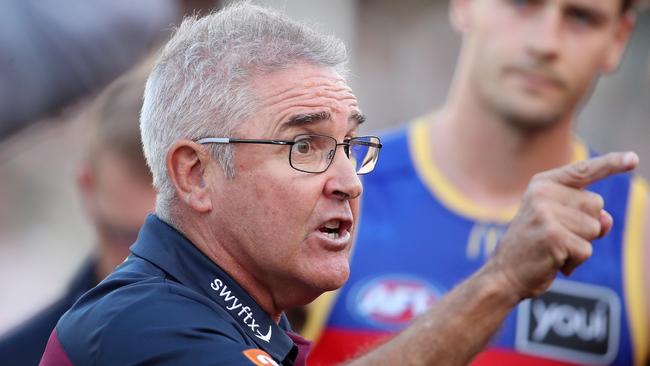 ADELAIDE, AUSTRALIA - MARCH 18: Chris Fagan, Senior Coach of the Lions with his players at 3 quarter time during the 2023 AFL Round 01 match between the Port Adelaide Power and the Brisbane Lions at Adelaide Oval on March 18, 2023 in Adelaide, Australia. (Photo by Sarah Reed/AFL Photos via Getty Images)