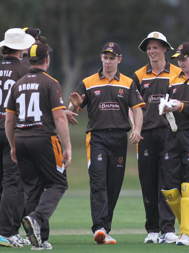 Kensington players celebrate the wicket of Sboro. Picture: AAP/Dean Martin