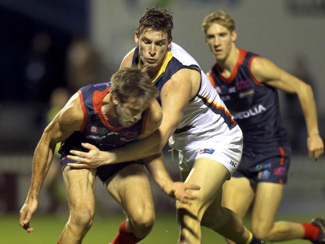 SANFL: Norwood v Adelaide at The Parade, 3 May 2019. Crows Josh Jenkins and Norwoods Brady Dawe.Picture Dean Martin