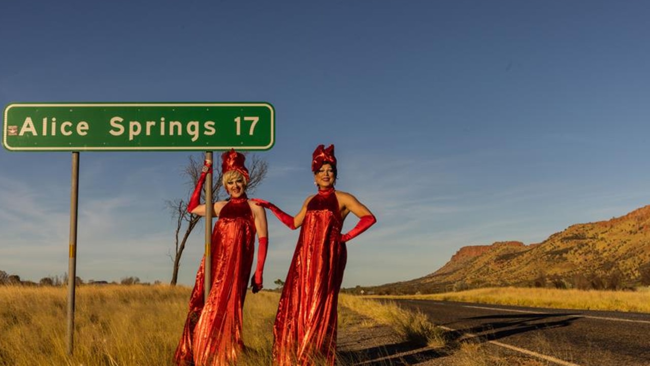 Iconic Northern Territory drag queens Daniel Cunningham (Marzi Panne) and Ben Graetz (Miss Ellaneous) strike a pose at the spectacular Simpsons Gap turn-off in the Tjoritja/West MacDonnell National Park on the outskirts of Alice Springs, to celebrate the opening of the iconic FabALICE festival which runs from April 9-12. Pic: Helen Orr