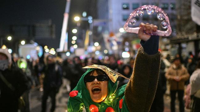 Thrilled protester. Picture: Anthony Wallace/AFP