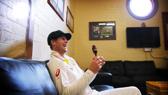 Player of the series Smith with the urn in the dressing rooms. Picture. Phil Hillyard