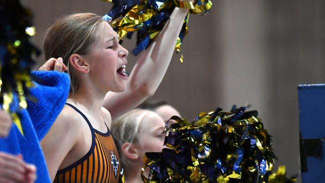 Fans cheer on their schools. Action from the CaSSSA swimming championships. Picture, John Gass