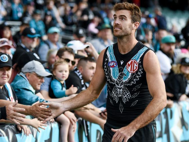 ADELAIDE, AUSTRALIA - JUNE 03: Scott Lycett of Port Adelaide thansk the fans after the round 12 AFL match between Port Adelaide Power and Hawthorn Hawks at Adelaide Oval, on June 03, 2023, in Adelaide, Australia. (Photo by Mark Brake/Getty Images)