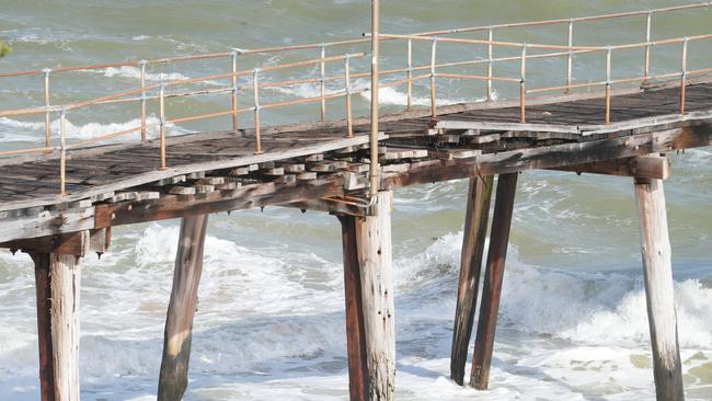 Port Noarlunga Jetty was severely damaged in yesterday’ storm. Picture: Dean Martin