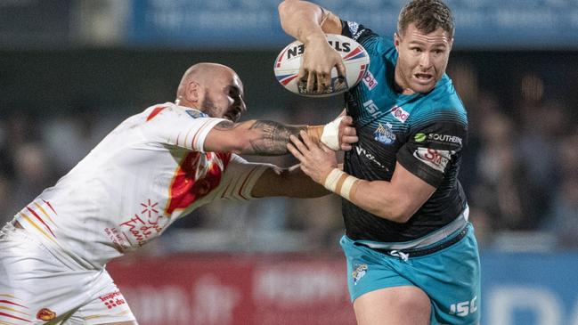 Trent Merrin will bring some much needed experience to the club in his Dragons return. Photo by Tim Clayton/Corbis via Getty Images)