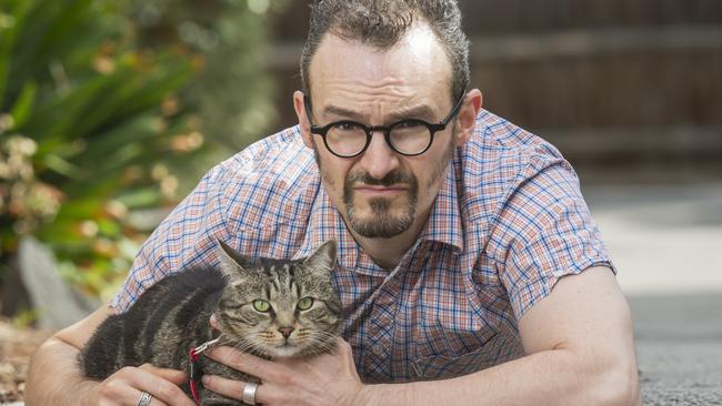 Scott Steensma is frustrated with registration fees for his cat Cosmo. Picture: Rob Leeson