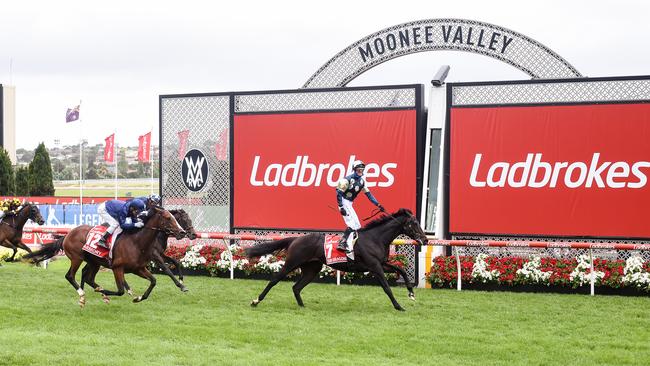 Glen Boss stands in his irons as Sir Dragonet passes the post to win the 2019 Cox Plate at Moonee Valley. Picture: Pat Scala / Racing Photos