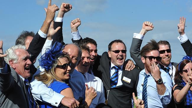 Connections celebrate as Buffering edges out Moment Of Change in the Winterbottom Stakes. Picture: Graeme Collopy