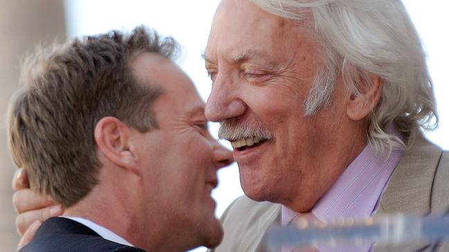 Kiefer Sutherland hugs his father Donald in 2008. Picture: AFP