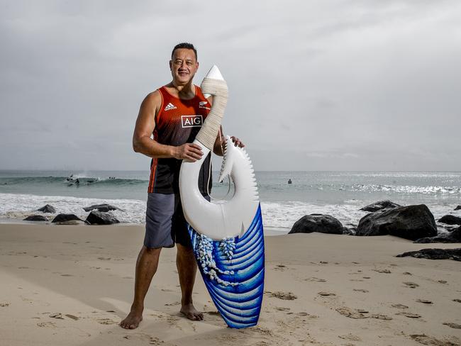 Aylmer Kenny carves amazing Maori designs into surfboards and recently quit work to focus on them full time after a push from his ancestors. Picture: Jerad Williams