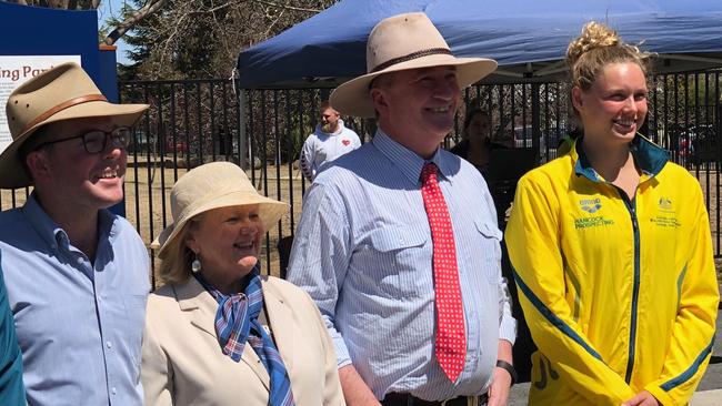 World swimming championship silver medallist Minna Atherton, far right, and world junior swimming championship representative Alexander Grant with dignities at the Melling Park opening.