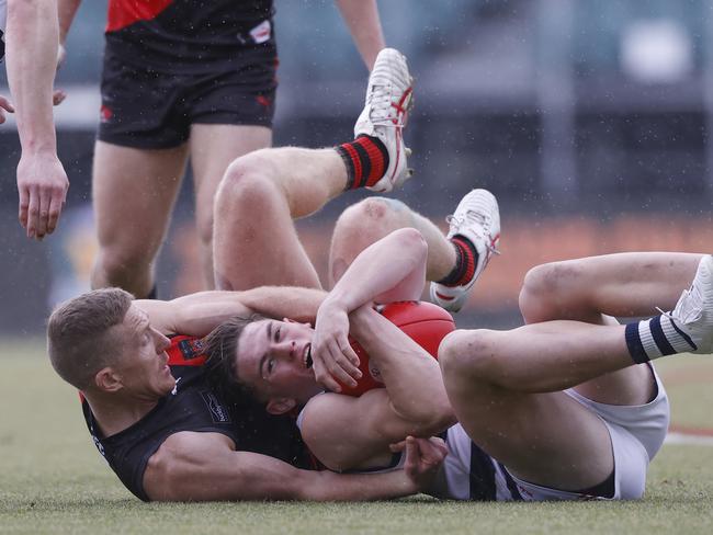 Brad Cox-Goodyer North Launceston and Riley Hooker Lauderdale.  TSL grand final 2024 - North Launceston V Lauderdale.  Picture: Nikki Davis-Jones