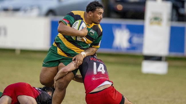 Surfers prop Peryhn Martin is tackled. Picture: Jerad Williams