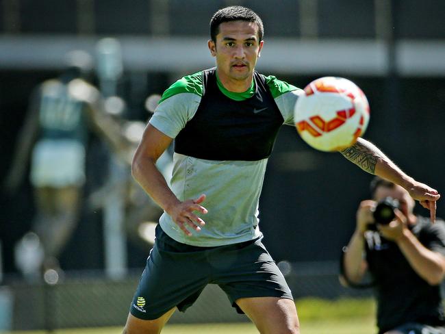 Tim Cahill puts in the hard yards at training.