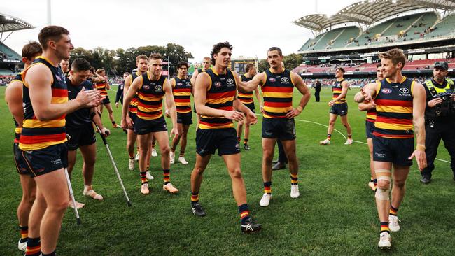 Borlase leads the Crows off the ground. Picture: James Elsby/AFL Photos