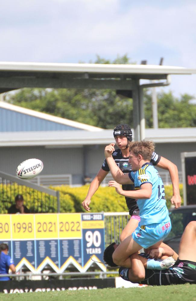 Taj Lateo (headgear) defending during the Connell Cup season for Tweed.