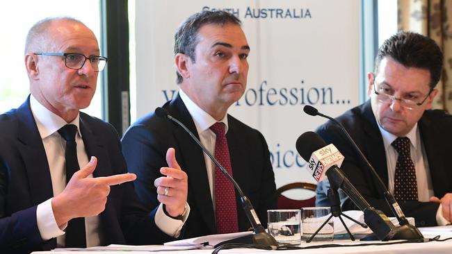 Premier Jay Weatherill, Opposition leader Steven Marshall and leader of SA Best party Nick Xenophon address questions at the AMA political leaders breakfast. Picture: AAP/Mark Brake