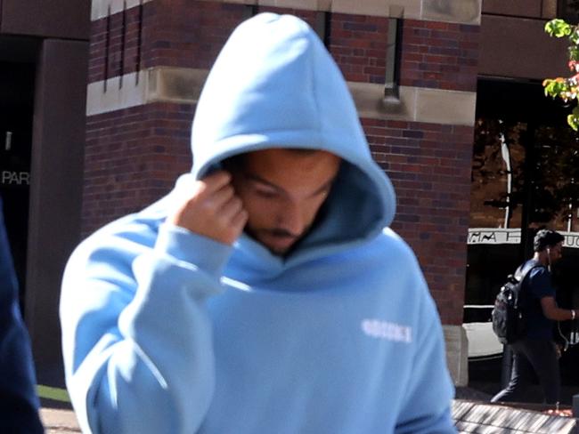 SYDNEY, AUSTRALIA - NewsWire Photos MAY 17, 2024: Clayton Lewis pictured leaving Parramatta police station with his lawyer. Three A-League soccer players arrested over alleged betting corruption.Picture: NCA NewsWire / Damian Shaw