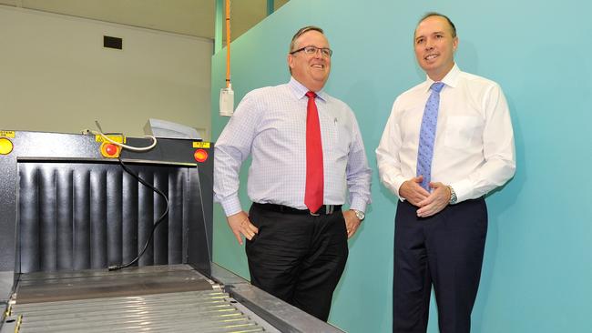 Peter Dutton and Federal Member for Herbert Ewen Jones at the Townsville Airport.