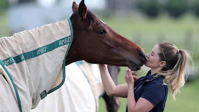 Payne with an unnamed two-year-old horse at Nottingham. Picture: Michael Klein