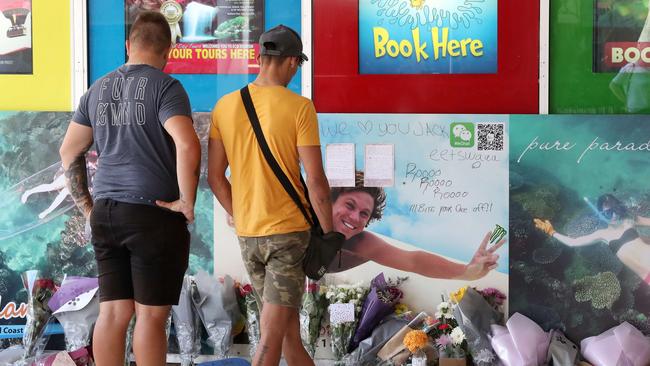 Flowers, hand written notes and other items left by the friends of murder victim Jack Beasley at the scene of the tragedy outside the Surfers Paradise IGA in 2019. Photographer: Liam Kidston.