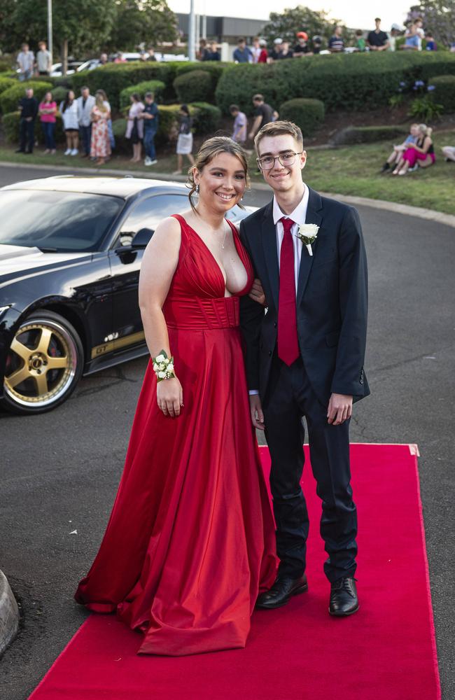 Graduate Lucy Carpenter and partner Brannon Clerihew arrive at Mary MacKillop Catholic College formal at Highfields Cultural Centre, Thursday, November 14, 2024. Picture: Kevin Farmer