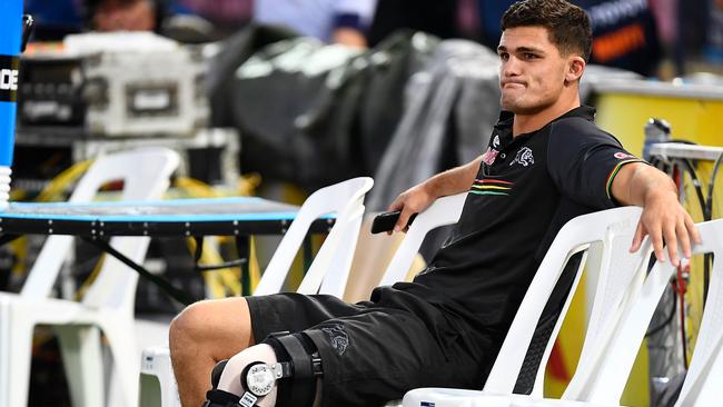 Nathan Cleary of the Panthers looks on.