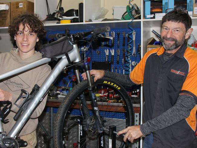 WHEELY GOOD: Year 10 Woodlawn student Oscar Murchison, 15, said he really loved undertaking a week's work experience as a bike mechanic with Harris Cycles proprietor, Darryl Pursey. Photo: Alison Paterson