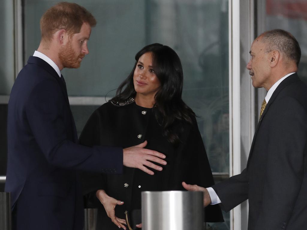 Prince Harry, and his wife Meghan Duchess of Sussex with the New Zealand High Commissioner Jerry Mateparae, at New Zealand House in London. Picture: AP