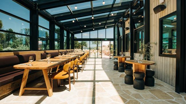 Conservatory-style dining room showcases the delicious food.